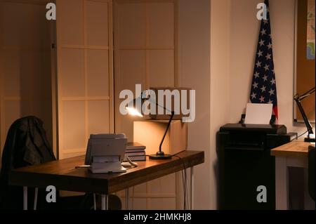 Workplace of FBI agent in office at night Stock Photo