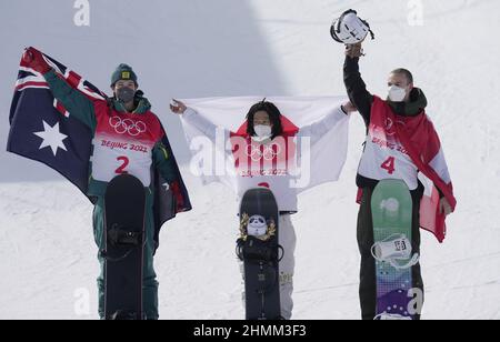 Zhangjiakou, China. 11th Feb, 2022. Gold medalist Ayuma Hirano from Japan (C), silver medalist Scotty James from Australia (L) and bronze medalist Jan Scherrer from Switzerland stand on the podium with their national flags after the Men's Snowboard Halfpipe finals at the 2022 Winter Olympics in Zhangjiakou, China on Friday, February 11, 2022. Photo by Bob Strong/UPI . Credit: UPI/Alamy Live News Stock Photo