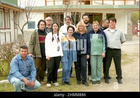 The team of writers and journalists at the 'Formula As' magazine during a working trip, approx. 2000. Standing, left to right: Bogdan Lupescu, Ion Longin Popescu, Ines Hristea, Sorin Preda, Sanziana Pop, Ilie Tudor, Rodica Demian. Stock Photo