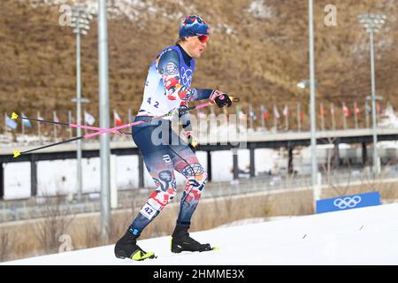 Johannes Hoesflot Klaebo of Norway, centre, celebrates his victory with ...