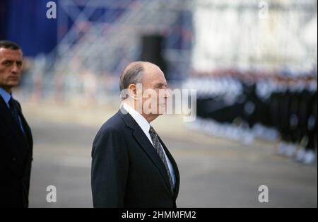 President of the French Republic Franois Mitterrand inaugurating the 'Charles-de-Gaulle' aircraft carrier in Brest on May 7, 1994. Launching of the ship, with Franois Lotard in the background Stock Photo
