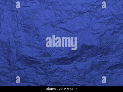 Crumpled craft blue color paper texture for background Stock Photo