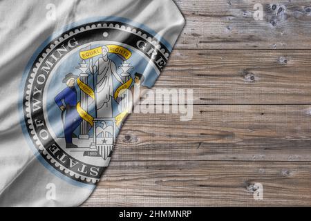 United States country state Wyoming Seal on old wooden pattern table board Stock Photo