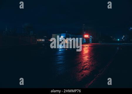 Red and white lights from passing cars. Night highway. Stock Photo