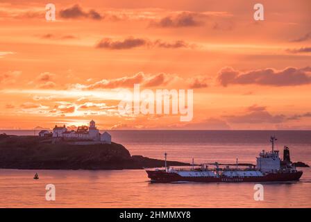 Roches Point, Cork, Ireland. 11th Feb, 2022. LPG tanker Gas Spirit passing the Roches Point lighthouse before dawn on her way to the National Oil Berth in Tivoli, Cork, Ireland. - Credit; Credit: David Creedon/Alamy Live News Stock Photo