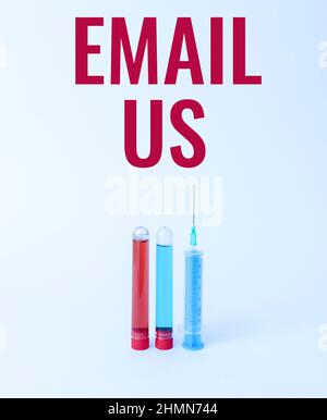 Conceptual display Email Us. Word Written on Sending a commercial message to a group of showing using mail Laboratory Testing And Analyzing Substance Stock Photo