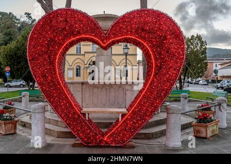 A big red heart with colored lights in Cavalca square, to celebrate Valentine's Day, Vicopisano, Pisa, Italy Stock Photo