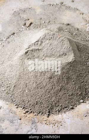 pile of cement and sand mixer, ready to make cement mortar, home improvement, construction and masonry work concept Stock Photo