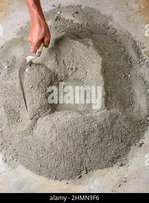 Bucket cement mix with on construction site the ingredients. Brick, Stone,  Mortar, Sand Stock Photo - Alamy