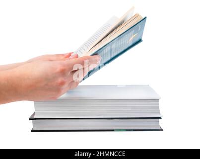 Reading book and education concept. Hands holding book isolated on white background. Books stack. High quality photo Stock Photo