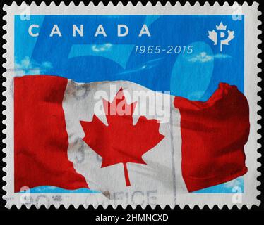 Canadian flag on postage stamp Stock Photo