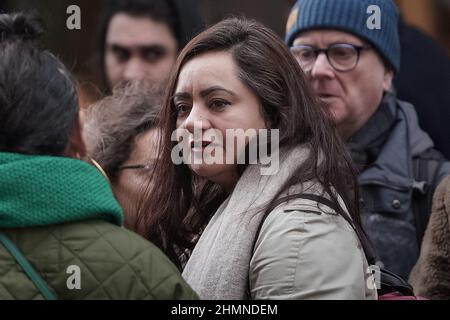 London, UK. 11th Feb 2022. Tahra Ahmed speaks to her supporters outside Old Bailey court prior to sentencing. Ahmed, 51, of Lansdowne Road, Haringey, was found guilty on 14th January following a trial at Old Bailey of stirring up racial hatred by posting antisemitic material on her personal Facebook page including derogatory posts made in the aftermath of the Grenfell Tower fire tragedy. Credit: Guy Corbishley/Alamy Live News Stock Photo