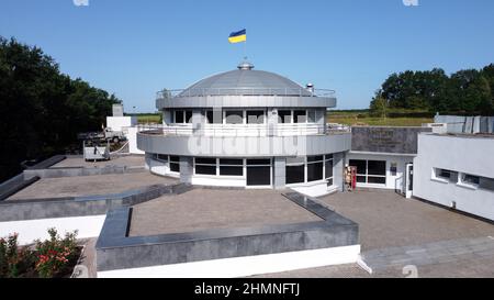 Aerial photography of World War II museum building with Ukrainian flag on top in The Marshal Konev Height Memorial in Kharkov. Kharkiv, Ukraine - Augu Stock Photo