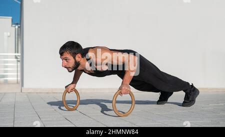 Incline ring push ups - The Body Dojo