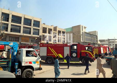 Pakistan. 11th Feb, 2022. KARACHI, PAKISTAN, FEB 11: View of venue after a fire broken out incident as the fire  brigade officials are busy in extinguishing fire and rescue operation, at chemical factory located  on Korangi area in Karachi on Friday, February 11, 2022. A fire broke out in a chemical factory  located in Karachi’s Korangi on Friday. Getting the information as many as 14 fire tenders  reached Korangi’s Mehran Town to control the raging fire. The firefighters successfully rescued  the workers trapped in the burning factory. The cause of the fire is unknown, whereas, the rescue  te Stock Photo