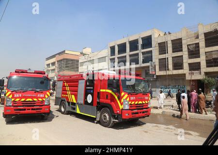 Pakistan. 11th Feb, 2022. KARACHI, PAKISTAN, FEB 11: View of venue after a fire broken out incident as the fire  brigade officials are busy in extinguishing fire and rescue operation, at chemical factory located  on Korangi area in Karachi on Friday, February 11, 2022. A fire broke out in a chemical factory  located in Karachi’s Korangi on Friday. Getting the information as many as 14 fire tenders  reached Korangi’s Mehran Town to control the raging fire. The firefighters successfully rescued  the workers trapped in the burning factory. The cause of the fire is unknown, whereas, the rescue  te Stock Photo