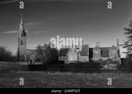 All Saints Church and Pilton Manor, Pilton village, Northamptonshire, England, UK Stock Photo