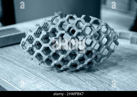 Gray abstract model printed on 3d printer from powder on background. Stock Photo