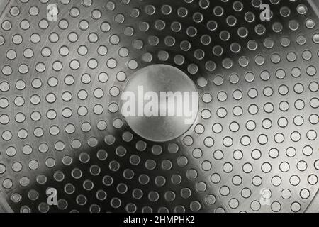 Induction frying pan bottom. Metal texture. Extrem close-up. High resolution photo. Full depth of field. Stock Photo