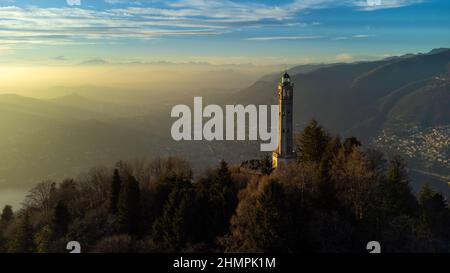 Aerial panoramic drone view of Faro Voltiano, Brunate, Lake Como, Lombardy, Italy Stock Photo