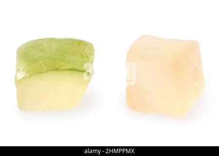 Two pieces of glazed dried fruit isolated on white. Stock Photo