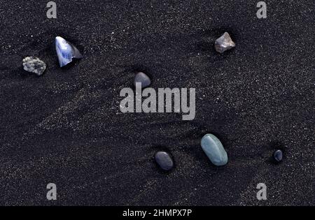 pebbles and shell on black sand beach at Stokksnes, Hornafjordur, Iceland. Stock Photo