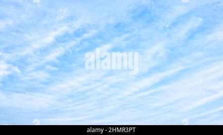 Light-blue sky with white clouds - background Stock Photo