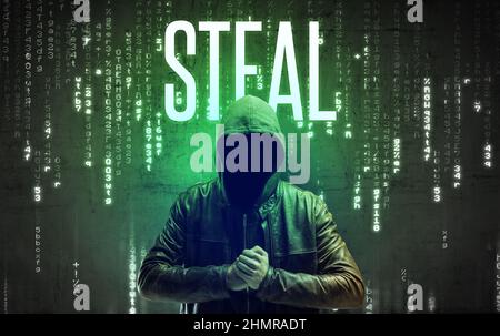 Faceless hacker with inscription Stock Photo