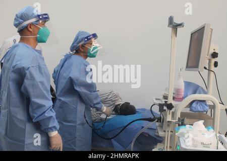 Juba, South Sudan. 10th Feb, 2022. Andrew Kongor Garang, a 59-year-old electrician in South Sudan's Ministry of Higher Education, receives medical examination at Juba Teaching Hospital in Juba, South Sudan, Feb. 10, 2022. TO GO WITH: 'Chinese medics offer respite to South Sudan's citizens grappling with ailments' Credit: Denis Elamu/Xinhua/Alamy Live News Stock Photo