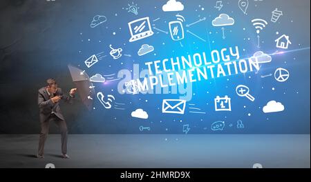 Businessman defending with umbrella, modern technology concept Stock Photo