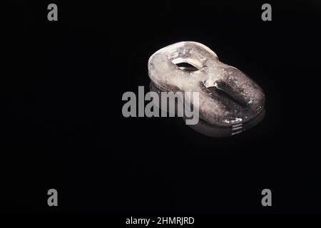 Melted Eight A melted ice figure Eight on a black background with a reflection Stock ...