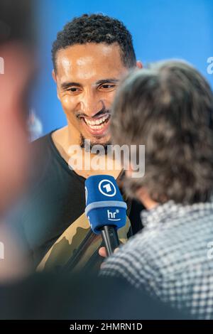 Los Angeles, USA. 11th Feb, 2022. NFL pro Jakob Johnson gives an interview to a journalist. The NFL is playing its first regular-season game in Germany this fall in Munich. Johnson is a professional with the New England Patriots. Credit: Maximilian Haupt/dpa/Alamy Live News Stock Photo