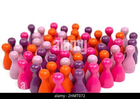 Lots of colorful wooden cones against a white background Stock Photo