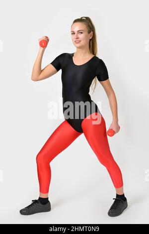 Fitness woman in leotard and white leggings Stock Photo | Adobe Stock