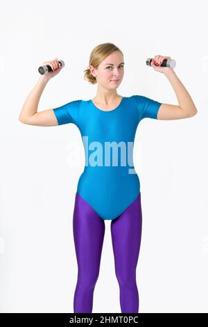 Workout, woman wearing a shiny spandex leaotard and leggings, sports wear of the 80s/90s Stock Photo