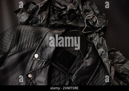 Blank label mockup for placing a logo on a black men's mid-season jacket Stock Photo