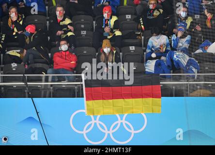 Beijing, China. 12th Feb, 2022. Olympics, ice hockey, preliminary round, group A, Germany - China, at the National Indoor Stadium, fans from Germany watching the match. Credit: Peter Kneffel/dpa/Alamy Live News Stock Photo