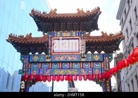 The Chinatown Gate is a grand entryway into London’s lively Chinatown district and a cultural landmark in central London, England, United Kingdom. Stock Photo