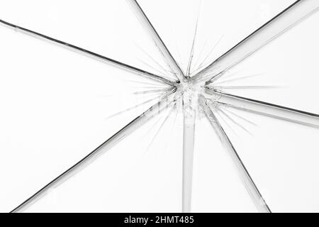Broken window glass crack splitter on white gray background Stock Photo