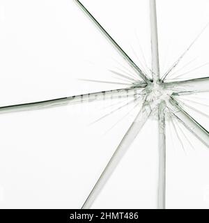 Broken window glass crack splitter on white gray background Stock Photo