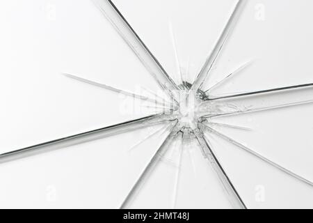 Broken window glass crack splitter on white gray background Stock Photo