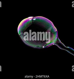 Soap Bubble in colorful colors on black background Stock Photo