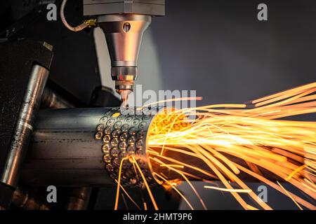 CNC Laser cutting of metal, modern industrial technology Making Industrial Details. The laser optics and CNC (computer numerical control) are used to Stock Photo