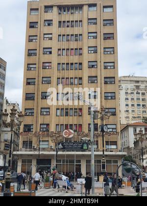 Air Algérie airl ines company main branch and the National Office of Culture and Information ONCI in Algiers. People walking and waiting in queue. Stock Photo