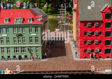 Billund, Denmark - June 25 2011: Lego model ogf a green house and a red warehouse Stock Photo