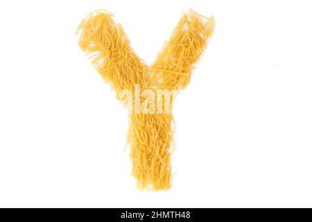 letter y made from raw chopped noodles isolated on white background. High quality photo Stock Photo