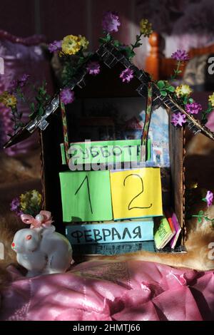 daily calendar in shape of the farm house with easter bunny for decoration or gift on holiday Stock Photo