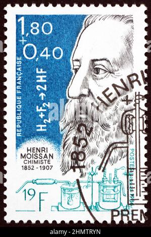 FRANCE - CIRCA 1986: a stamp printed in France shows Henri Moissan (1852-1907), was a French chemist and pharmacist who won the 1986 Nobel Prize in Ch Stock Photo
