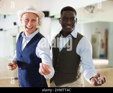 Two men dancing jazz in studio Stock Photo