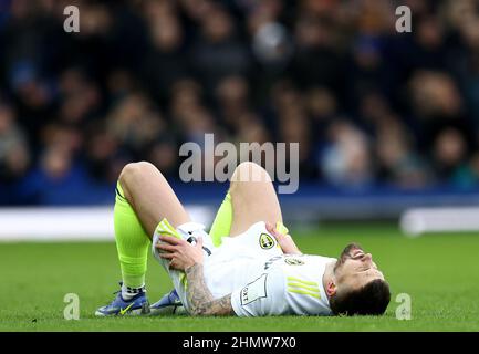 Liverpool, UK. 12th Feb, 2022. Stuart Dallas of Leeds United lies injured during the Premier League match at Goodison Park, Liverpool. Picture credit should read: Darren Staples/Sportimage Credit: Sportimage/Alamy Live News Credit: Sportimage/Alamy Live News Stock Photo